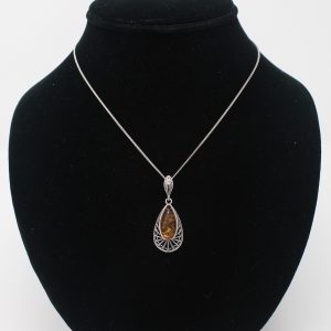 Amber Pendant with Silver Detail